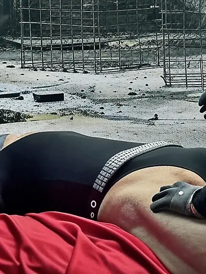 Black Superhero captured in netting. KO and fondle