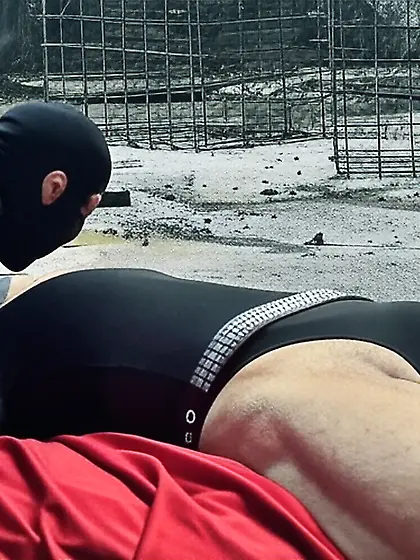 Black Superhero captured in netting. KO and fondle