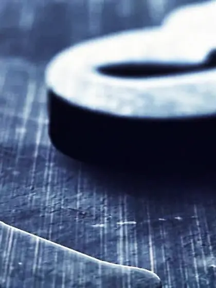 Dangerous-looking brunette masturbating fingers