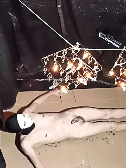 Wax is dripping from the laundry hanger.