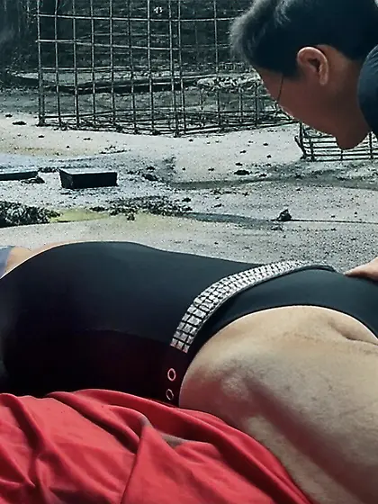 Black Superhero captured in netting. KO and fondle