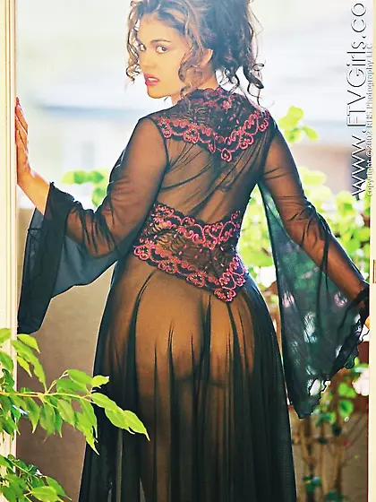 Big tits beauty showing her enviable curves while still in the n