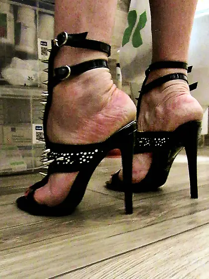 her fetish high heels with silver peaks