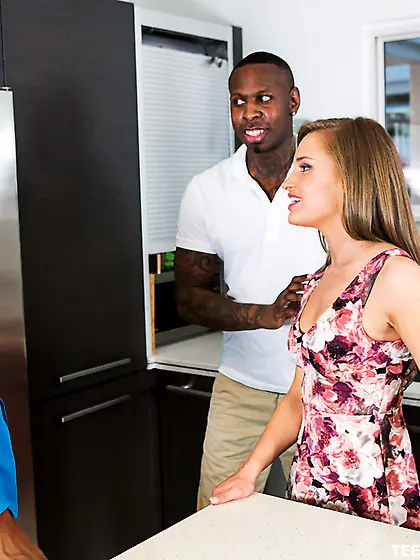 Leggy chick folds in two while pleasuring BBCs in the kitchen