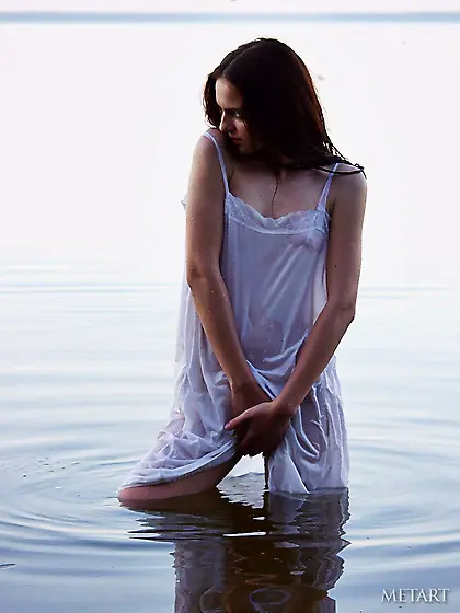 Brunette with a hairy pussy posing on the beach,  looking hot AF