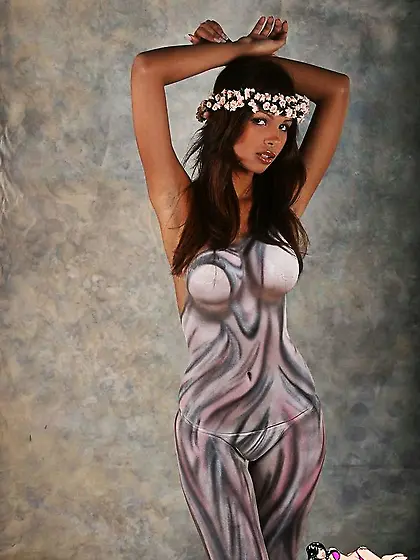 Sexy tanned brunette Karla Spice posing with her painted body we
