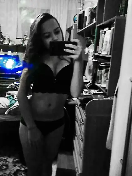 Cute teen shows off her curves sensually