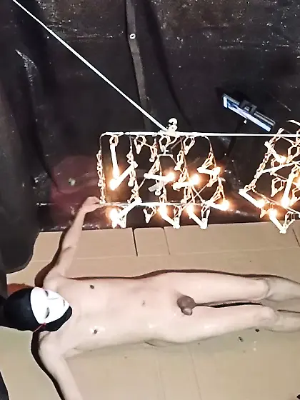 Wax is dripping from the laundry hanger.