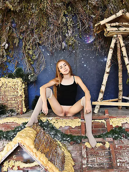 Playful minx Greta A not shy to perform strip show on a small wo