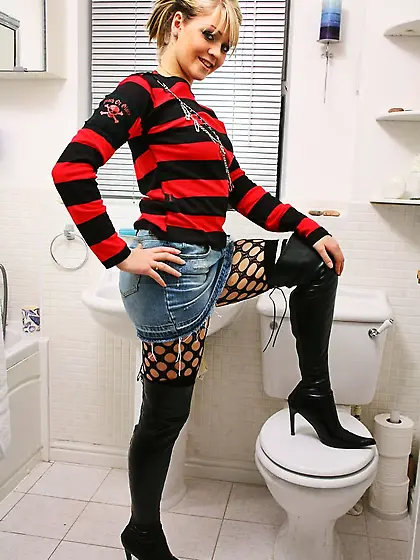 Frisky doll Melissa in black net pantyhose and white panties sho