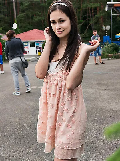 Elegant and graceful teen brunette Lilian A exposes her creamy b