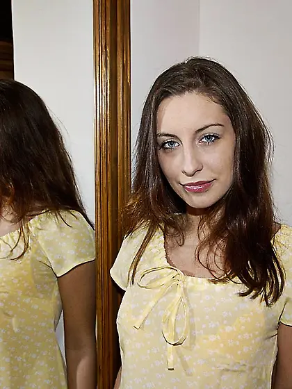 Michaela gets naked at home