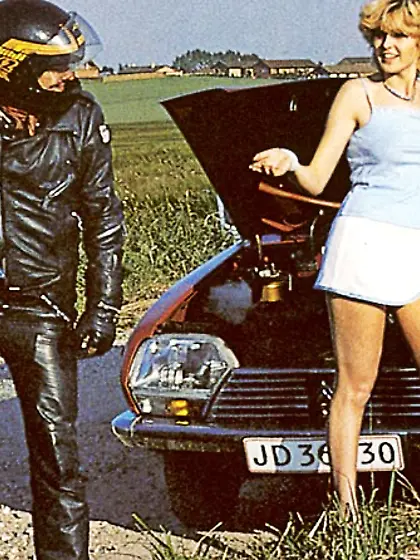 Retro blonde breaks car