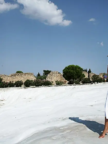 Sun-kissed brunette flashing her gorgeous booty in various publi