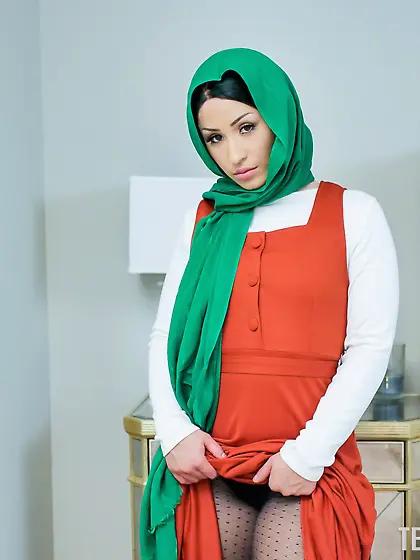 Sexy arab babe Goldie Rush sits her shaved pussy down on a hard