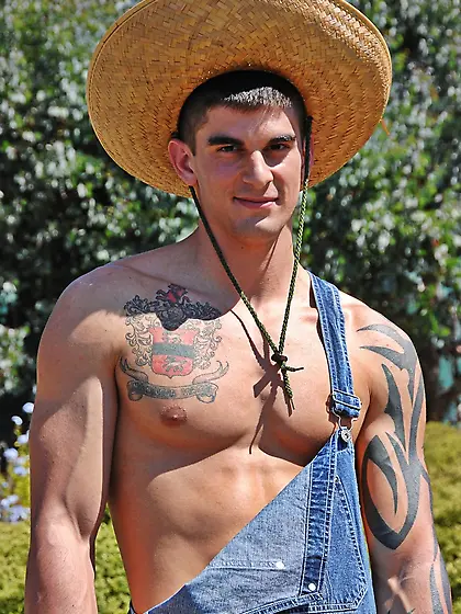 Britney Amber gives a blowjob to a country boy stud in the offic