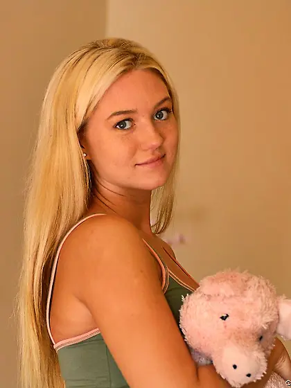 Sexy blond babe Alison Angel posing outdoors and shwos her beaut