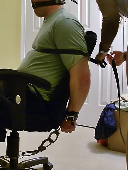 Tied husband in pantyhose