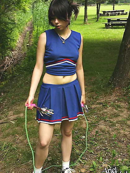 Ariel Rebel wears no panties under her skirt when skipping over