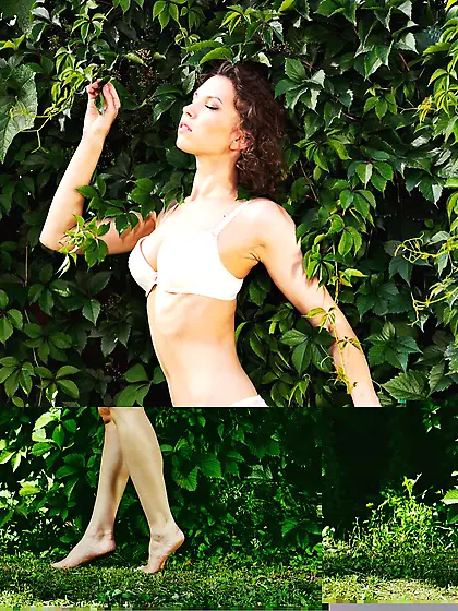 Luscious brunette babe Anita E sexily models outdoors with her t