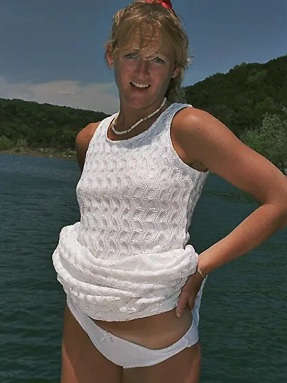 Blonde Summer Ann gets completely naked on a boat to show all he