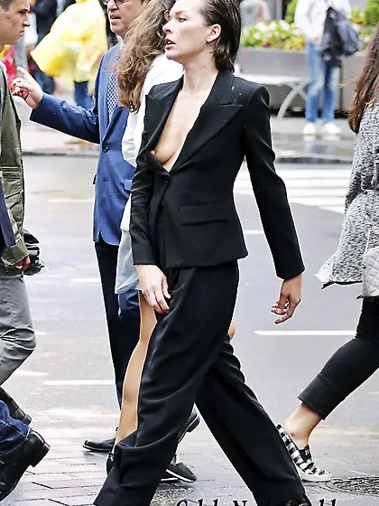Milla Jovovich Nipple Slip While On A Photo Shoot For Vogue Maga