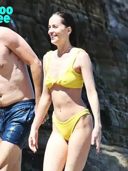 Dakota Johnson in a yellow bikini