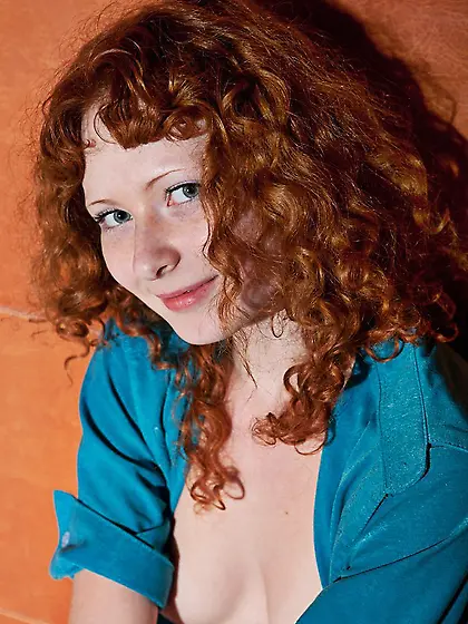 Slutty teen with red hair Rochelle A demonstrates nude body in t