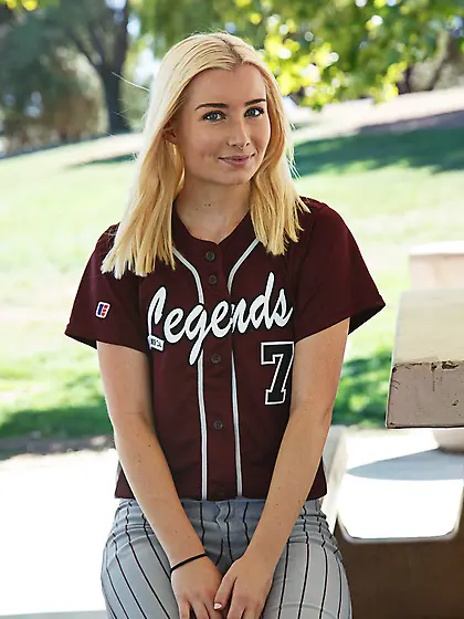 Baseball-playing blonde shows her body outdoors