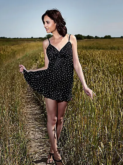 Romantic girl pulls off dress and shows her boobs and smooth pus