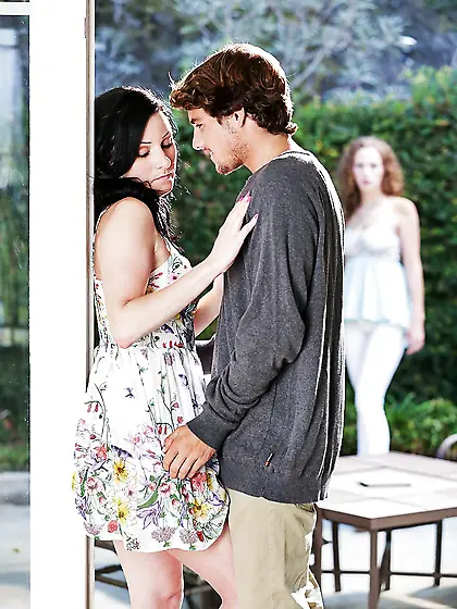 Teen girl watches beautiful brunette snogging with handsome neig