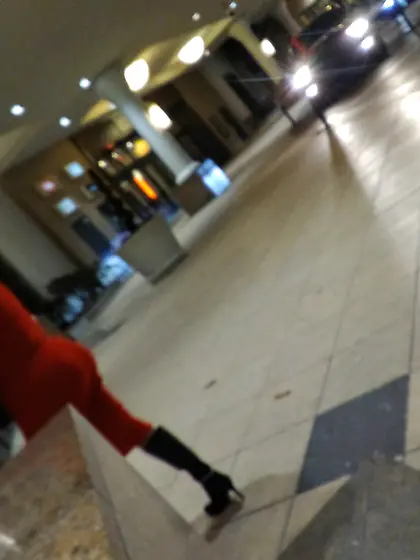 Red dress juicy GILF with phat ass at the casino.