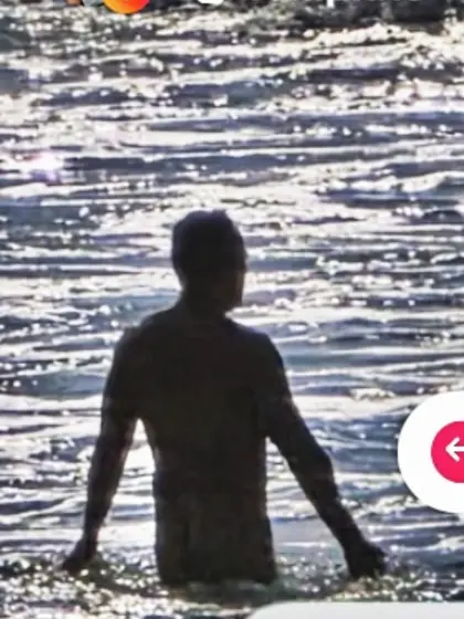 Man skinny dipping at the beach/pool