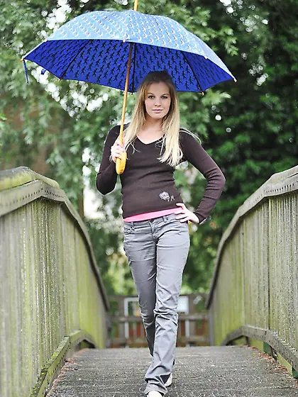 Charming blonde schoolgirl poses totally naked while hiding from