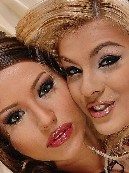 Glamour lesbians Jasmine Rouge and Cindy Dollar tongue fuck each