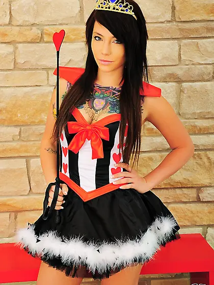 Beautiful teen chick Emma Ink strips her sexy costume and shows