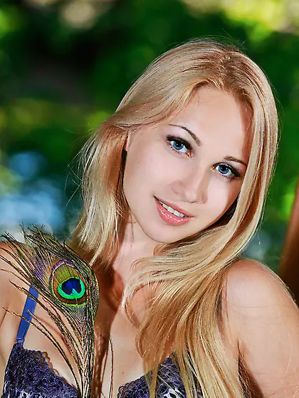 Cheerful Russian girl Kendell is alone in the gazebo so she can