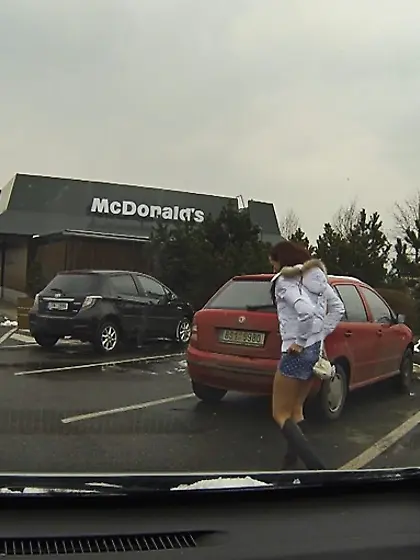 Leggy redhead denim shorts