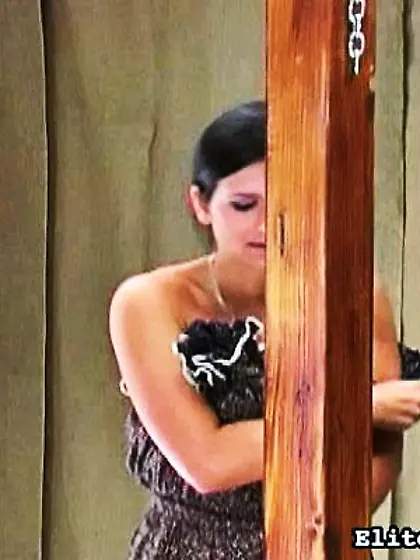 Brunette chick chained pole