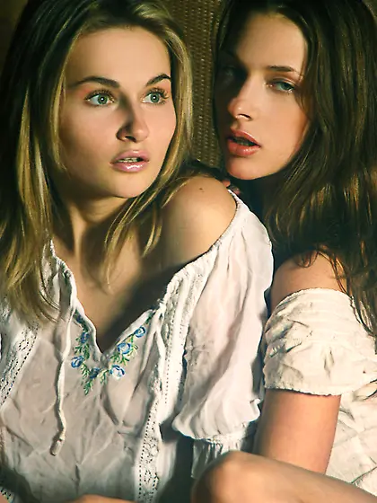 Katya D and Vika Ac strip together on the sofa and have amazing