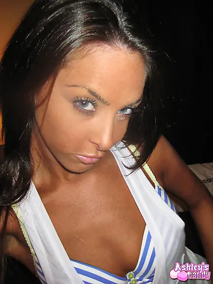 Hot brunette babe Ashleys Candy takes off her little thongs and