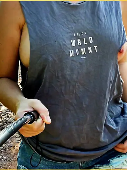 Wifey struts her stuff in a ripped shirt