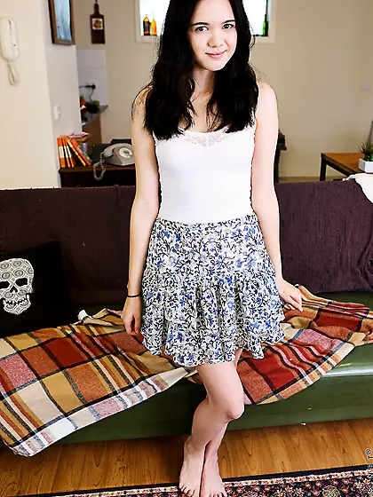 Frisky brunette Lily Rei is pulling pussy lips apart and stimula