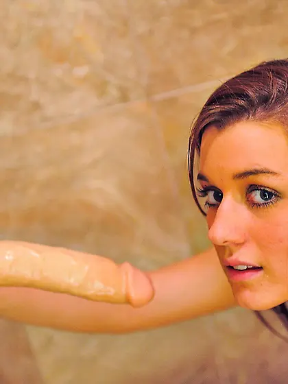 Young beauty worships a suction cup dildo in a wild solo gallery