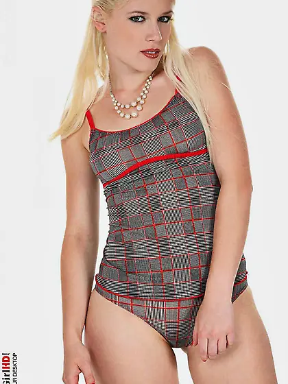 Blonde cutie Sandra Sweet looks right into the cam lying with wi