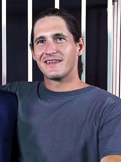 Hunk rides thick dildo