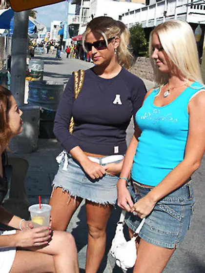 Two blonde girlfriends get dildo-fucked by a racy dark-haired le