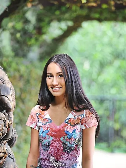 Flexible black-haired chick demonstrates her naked body in vario