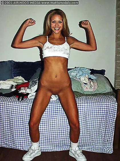 Well tanned amateur model Monique Alexander in white sneakers an