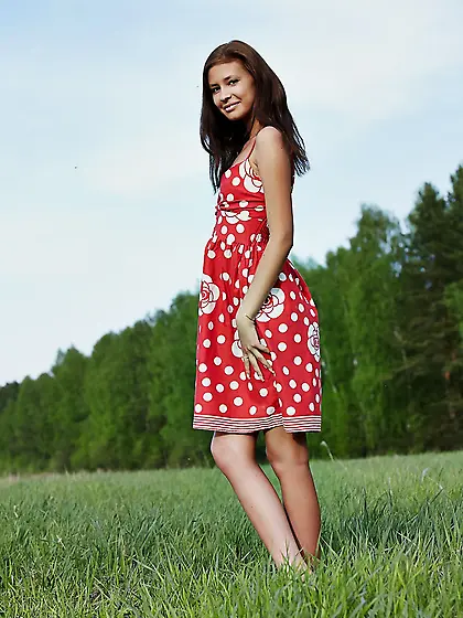 Free-spirited babe is not shy to pose completely nude outdoors i